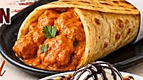 Butter chicken roti roll, served with a side of ice cream
